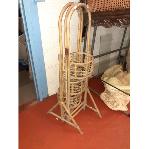 628 - Folding Three Basket Cane Plant Stand.