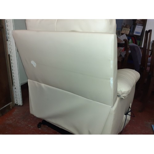 482 - Cream Leatherette Electric Rise & Recline Arm Chair.