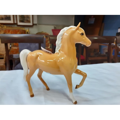 395 - Royal Doulton Prancing Palomino Horse.