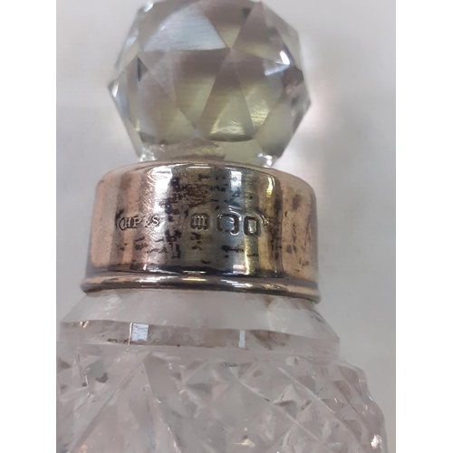 454 - Silver Hallmarked Rimmed Cut Glass Scent Bottle with Stopper.