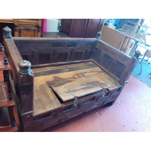 582 - Heavy Solid Teak Indian Pitara Circa 19th Century - has central lift lid for storage.