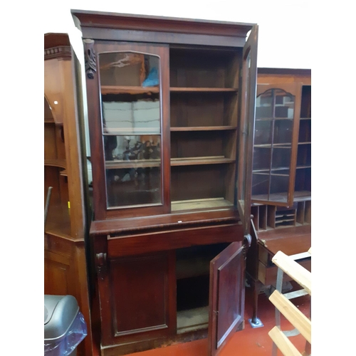 624 - Tall Mahogany Glazed Top Bookcase with Double Cupboard and Secret Drawer.