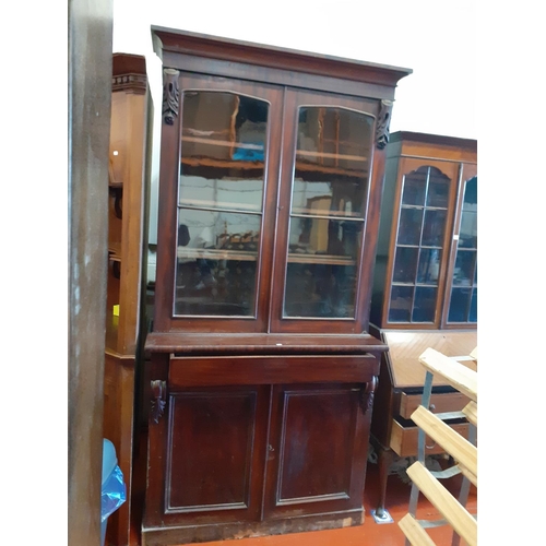 618 - Tall Mahogany Glazed Top Bookcase with Double Cupboard and Secret Drawer.