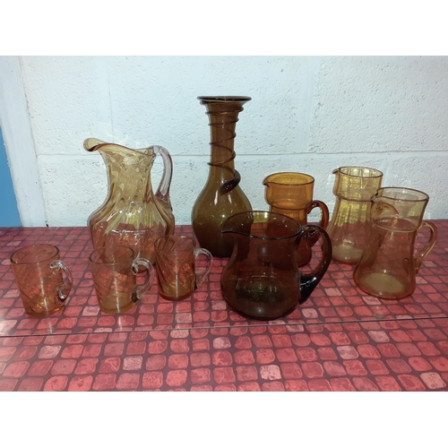 53 - Selection of Amber Glass Ware - Jugs, Glasses & Vase.