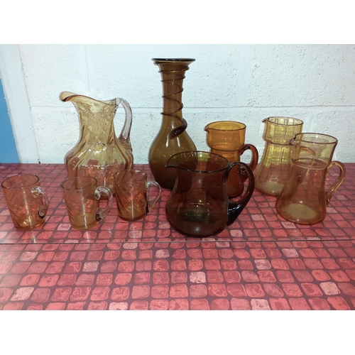 53 - Selection of Amber Glass Ware - Jugs, Glasses & Vase.