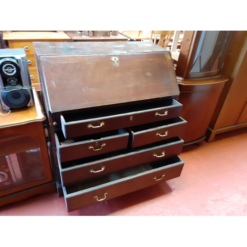 610 - Large Georgian Drop Front Writing Bureau over 5 Drawers with Brass Handles.