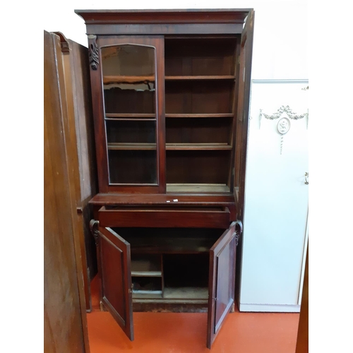 618 - Tall Mahogany Glazed Top Bookcase with Double Cupboard and Secret Drawer.