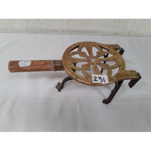 231 - Wooden Handled Brass Trivet Stand.