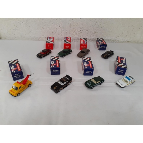 241 - Eight Boxed Corgis - Ford Wrecker Truck, Porsche 911 Turbo, Zakspeed Capri, Jaguar Track Car, Rover ... 