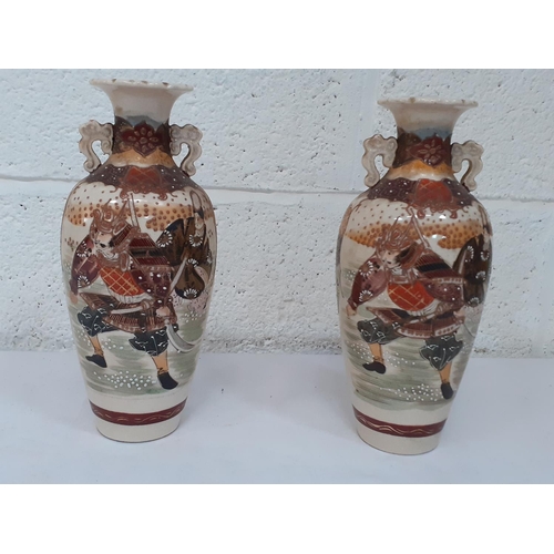 269 - Pair of Setswana Vases - approx 25 cm tall - one has hairline to top.