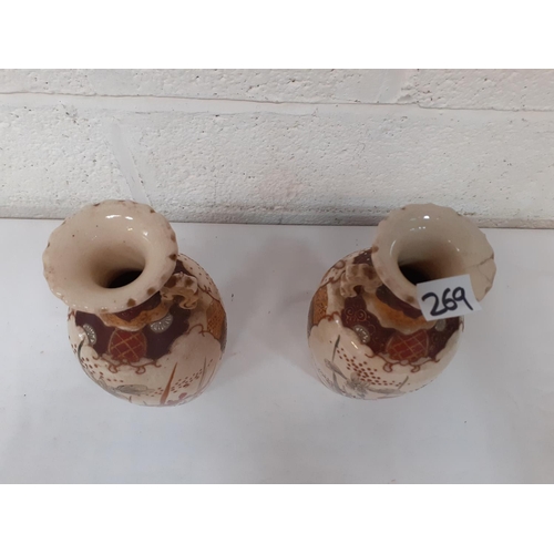 269 - Pair of Setswana Vases - approx 25 cm tall - one has hairline to top.