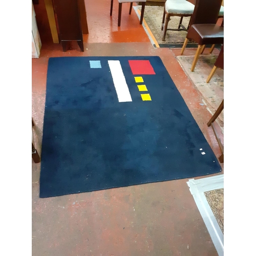 533 - Modern Blue Patterned Rug - approx 77cm x 59cm.