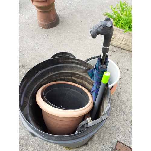 657 - Plastic Garden Bin & Selection of Plant Pots along with a Scottie Dog Handled Umbrella.