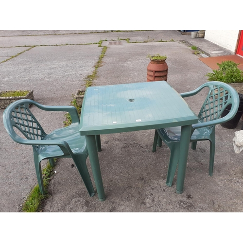 658 - Square Green Garden Patio Table & Two Matching Plastic Garden Chairs.