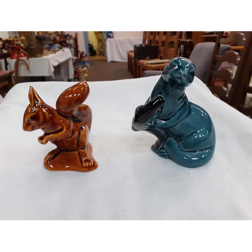 395 - Two Poole Pottery Figures - One Squirrel & One Otter.