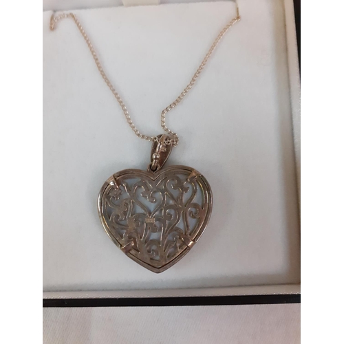 435 - 1925 Silver Heart Pendant with Mother of Pearl Inlay on Chain.