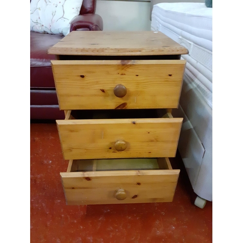 500 - Solid Pine Three Drawer Bedside Cabinet.