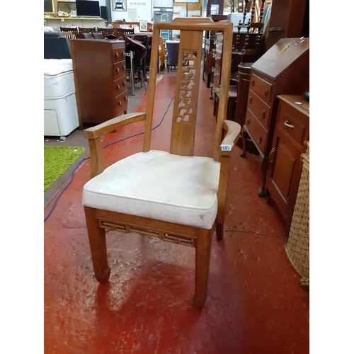 530 - Oak Framed Carver Chair with Carved Back.