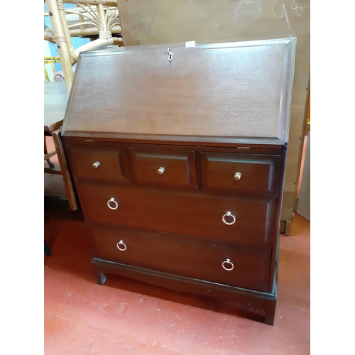 582 - Stag Mahogany Writing Bureau with 3 over 2 Drawer Base.