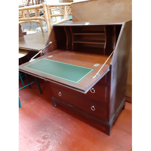 582 - Stag Mahogany Writing Bureau with 3 over 2 Drawer Base.