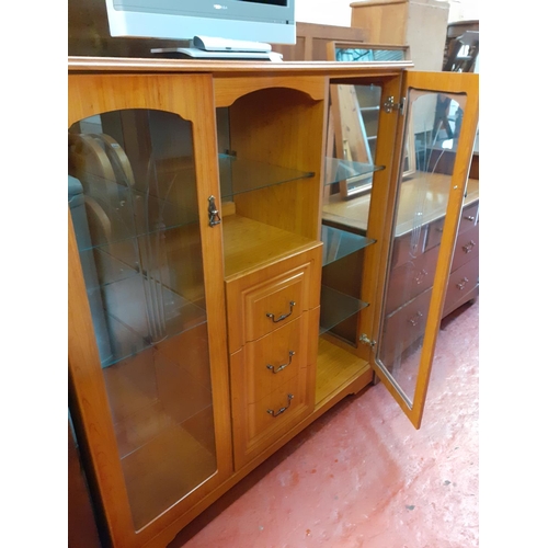 594 - Modern Pine Effect Side by Side Display Cabinet with Three Central Drawers and Glass Shelf Flanked b... 