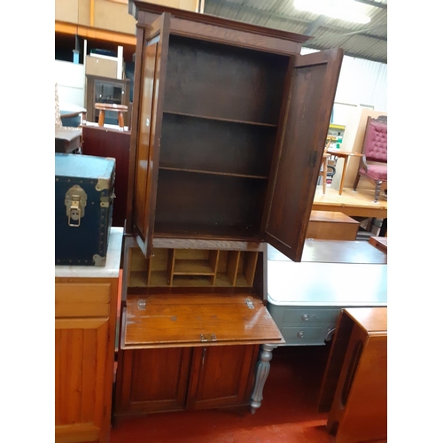 604 - Solid Oak Closed Top Bureau Bookcase with Single Drawer and Double Cupboard Base.