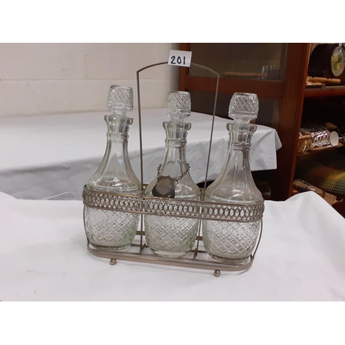 201 - Trio of Cut Glass Decanters in Plated Carry Stand.