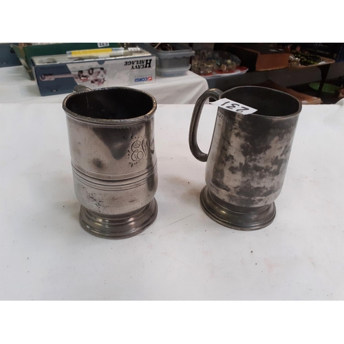 231 - Two 18th Century Pewter Half Pint Tankards - one has chip out of base.