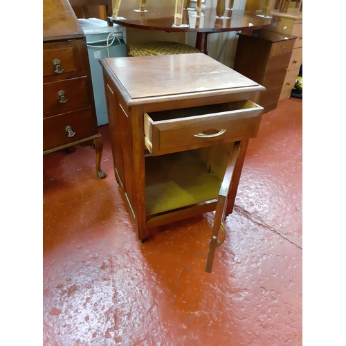 510 - Oak Single Drawer, Single Door Pot Cupboard on Casters.