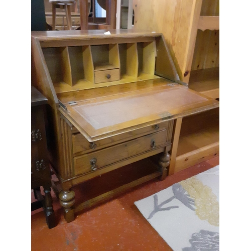 531 - Solid Oak Three Drawer Writing Bureau on Acorn Legs.