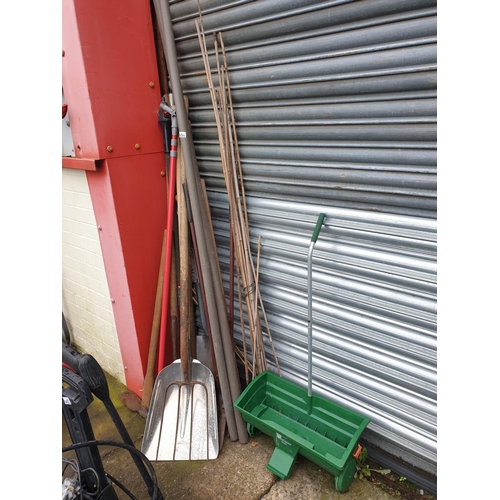 634 - Quantity of Garden Tools, Lawn Seeder, Bamboo Canes, Pipe etc.