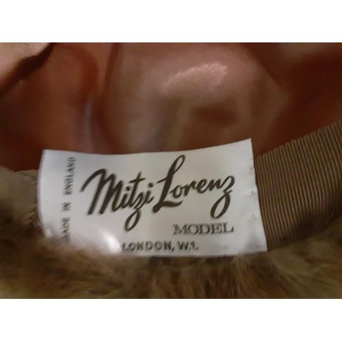 17 - Two Vintage 'Mitzi Lorenz' Faux Fur Hats .