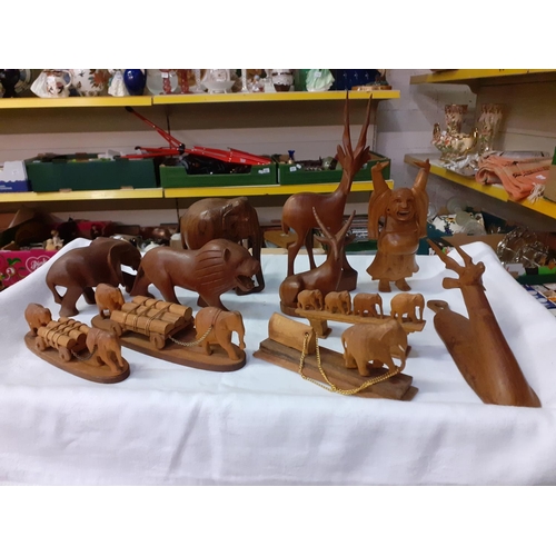 281 - Selection of Carved Wooden Animals to Include Elephants, Lions, Gazelle etc.