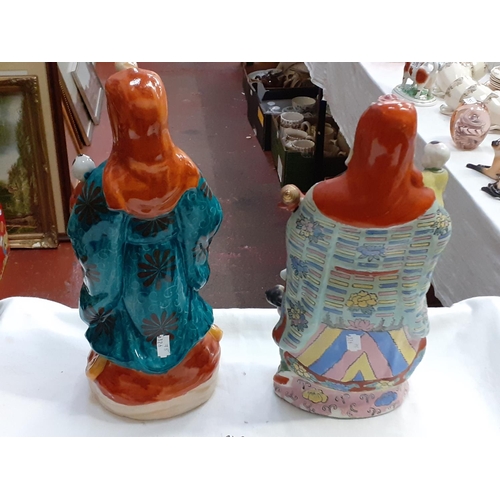 348 - Pair of Hand Painted Oriental Figures - approx 40cm tall.