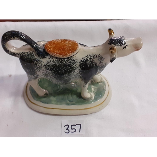 357 - 19th Century Staffordshire Spongeware Cow Creamer and Associated Cover.