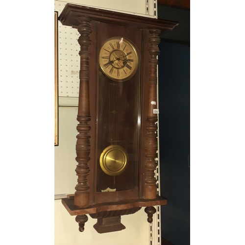 516 - Mahogany Cased Vintage Wall Clock with Pendulum & Brass Face.