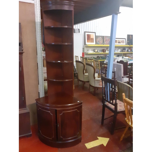 525 - Mahogany Corner Cabinet with Bow Front, Double Door Base & 4 Shelves to Top - bulge to the trim at t... 