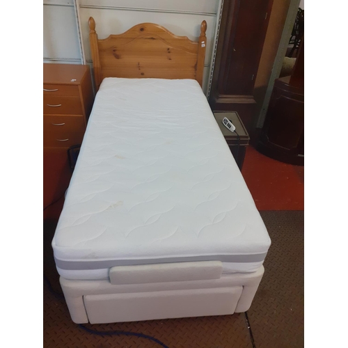 527 - Single Electrical Bed with Pine Headboard & Mattress.