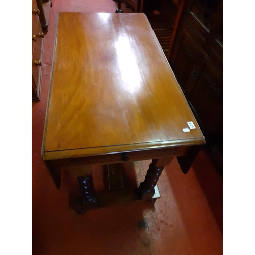 579 - Drop Leaf Table with Barley Twist Legs.