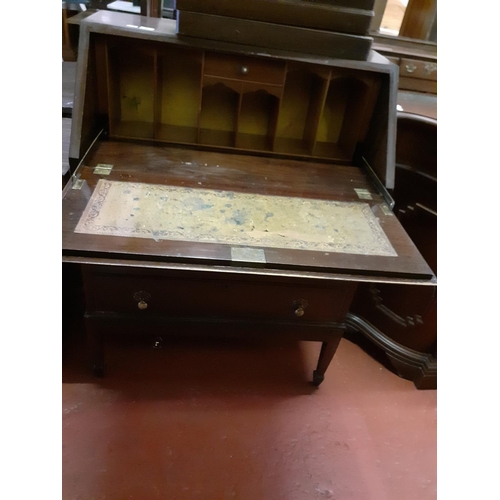 640 - Mahogany Three Drawer Bureau.