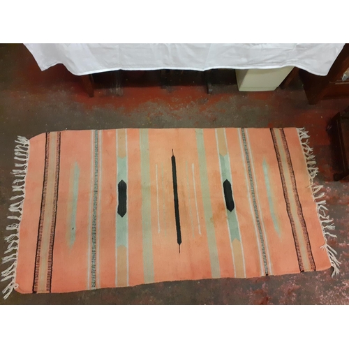 43 - Orange Striped Mat with Fringe Ends - has some marks.