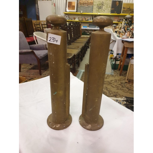 234 - Pair of Brass Scroll Holders.