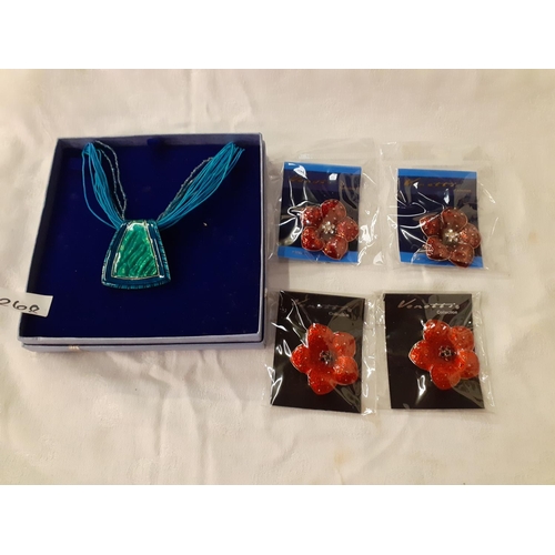 268 - Boxed Rope Necklace with Pendant along with Four NEW Flower Brooches.