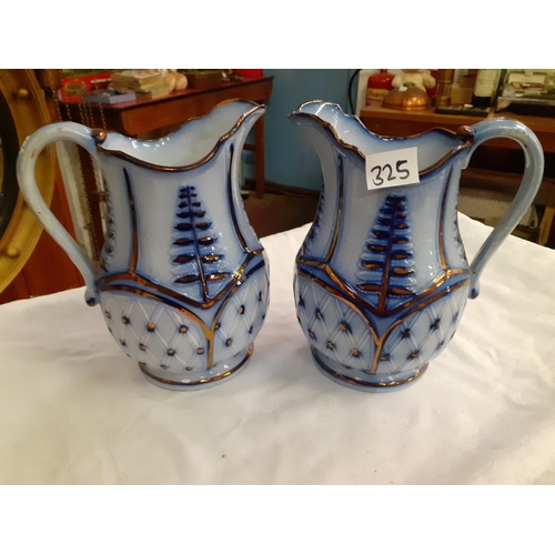 325 - Pair of Blue & White Lustred Jugs - approx 8