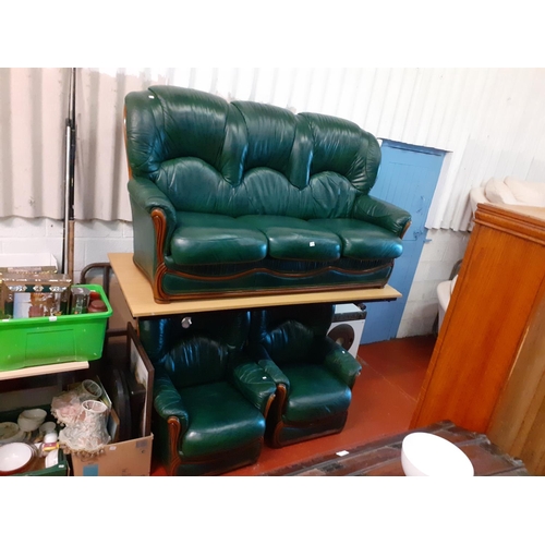 633 - Oak Framed Green Leather Three Seater Sofa with Two Matching Arm Chairs.