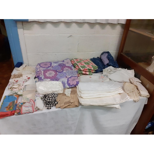 72 - A Box of Vintage Curtains, a Ladies Suit, Tablecloths and Linen.