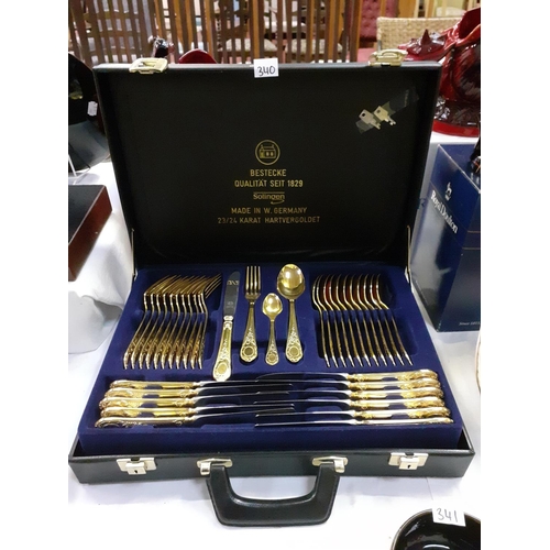 340 - Solingen 23/24 Karat Gold Plated Cutlery Set in Briefcase (two forks missing).