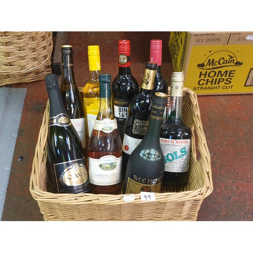 99 - Wicker Basket with Selection of Wines & Spirits Including Richot Brandy, Cava, Hardys, Merlot etc.