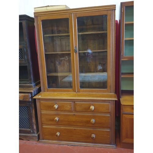 654 - Solid Oak Display Cabinet with Glass Door Top with Two Over Two Drawers.