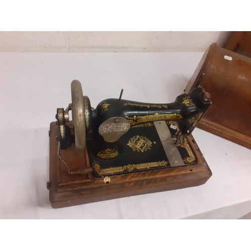 134 - Oak Cased Vintage Singer Sewing Machine.